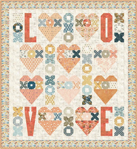 Fall N' Love heart quilt pattern by Audrey Tanke for BasicGrey. Fat eighth friendly quilt feature hearts, Xs and Os, and lots of L-O-V-E. Featured fabric is Cider by BasicGrey for Moda Fabrics. (Would be cute in Nutmeg fabric.) Download the PDF pattern here.