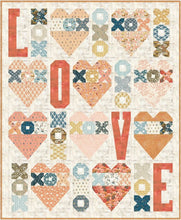 Load image into Gallery viewer, Fall N&#39; Love heart quilt pattern by Audrey Tanke for BasicGrey. Fat eighth friendly quilt feature hearts, Xs and Os, and lots of L-O-V-E. Featured fabric is Cider by BasicGrey for Moda Fabrics. (Would be cute in Nutmeg fabric.) Download the PDF pattern here.