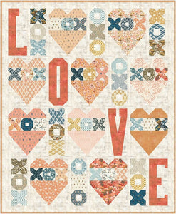 Fall N' Love heart quilt pattern by Audrey Tanke for BasicGrey. Fat eighth friendly quilt feature hearts, Xs and Os, and lots of L-O-V-E. Featured fabric is Cider by BasicGrey for Moda Fabrics. (Would be cute in Nutmeg fabric.) Download the PDF pattern here.